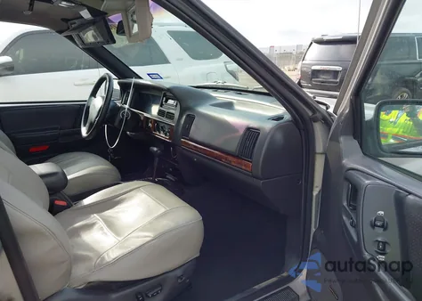 1997 Jeep Grand Cherokee Laredo/Tsi z USA, uszkodzony, nr VIN 1J4GX58Y0VC541843